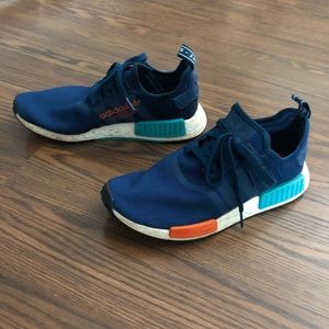 BLUE AND ORANGE ADIDAS NMD’S